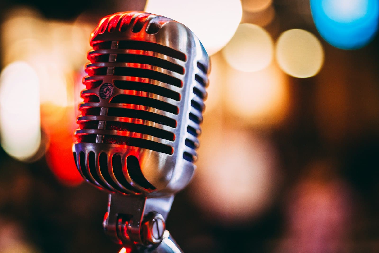 A microphone in a dim studio